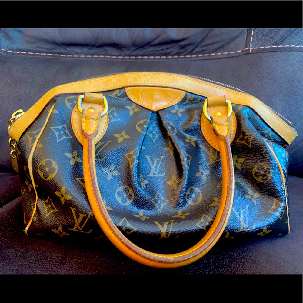 Authentic Louis Vuitton Tivoli with dust bag.